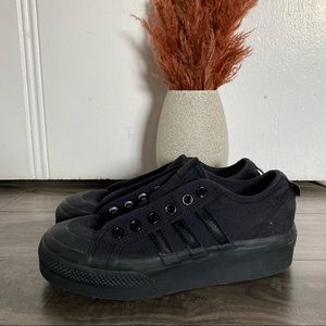 black Adidas platform shoes